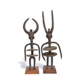 A pair of Bobo dance figures Burkina Faso bronze, 37.5cm and 33cm high, on bases. (2)