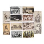 A collection of postcards black and white and tinted, of everyday scenes and figures from Africa,