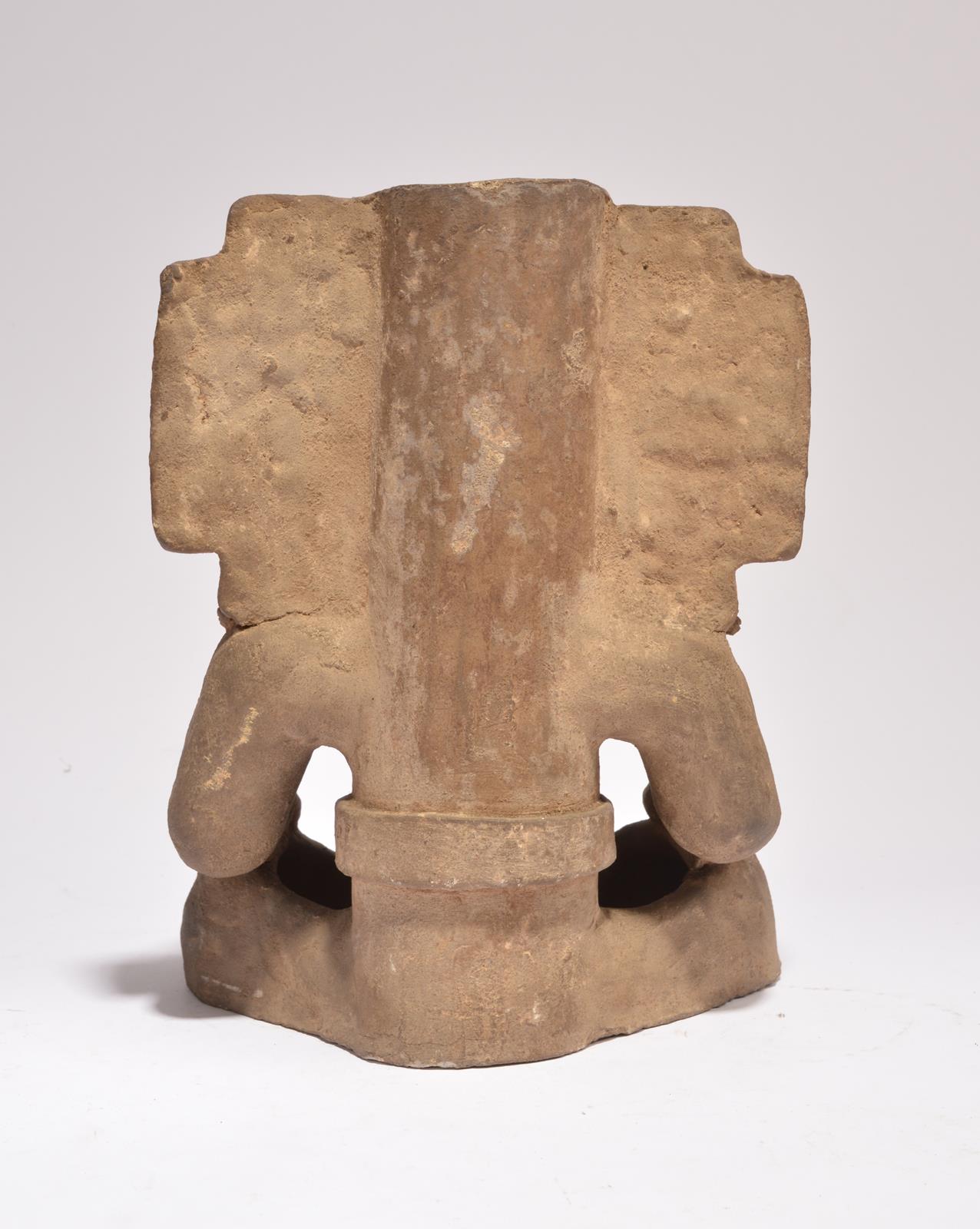 A Zapotec figural urn Mexico, circa 550 - 750 AD earthenware, seated with a cylinder body, wearing - Image 2 of 2