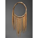 A Northwest Coast Shaman's neck-ring wood, cloth and twenty bone needle like pendants, 25.5cm