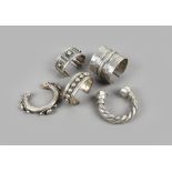 Five bracelets silver coloured metal, including four Egyptian, with hallmarks and the fifth Yemen of