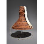 A ringed hat by Rhoda Mack Ahousat, Flores Island, British Columbia woven cedar with images of