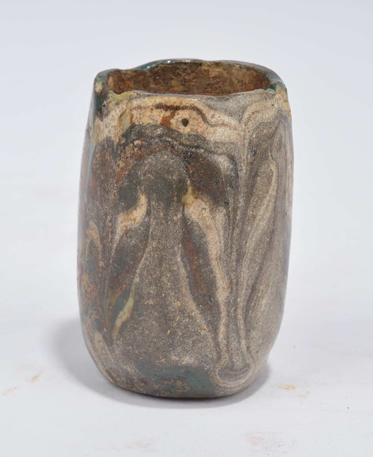 An Egyptian fragmentary core-formed glass vessel New Kingdom, 18th - 19th Dynasty, circa 1550 - 1185 - Image 3 of 3