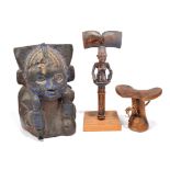 A Yoruba Shango staff Nigeria the kneeling female figure with a thunder axe crest and a child on her