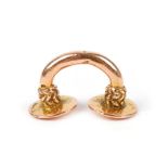 A Tairona nose ornament Colombia gold, 4.1cm wide, 28.5 grams.