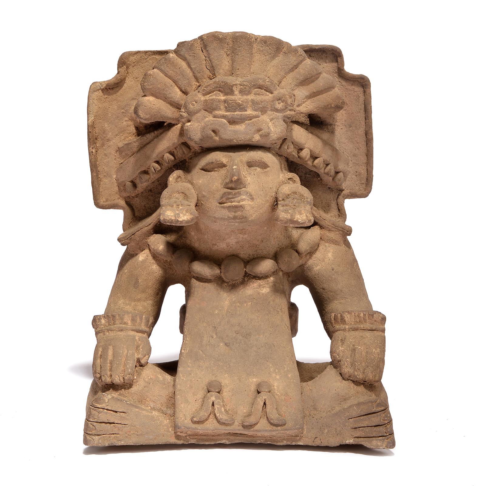 A Zapotec figural urn Mexico, circa 550 - 750 AD earthenware, seated with a cylinder body, wearing