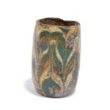 An Egyptian fragmentary core-formed glass vessel New Kingdom, 18th - 19th Dynasty, circa 1550 - 1185