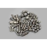 A collection of beads North Africa and Yemen silver coloured metal, spherical, pear shape and