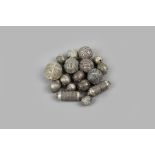 Four Yemen signed large beads silver coloured metal, spherical with applied flowerheads and beaded
