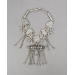 A Bedouin necklace Yemen silver coloured metal, 38.5cm long. Provenance Professor D Abouseif