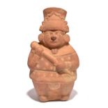 A Moche figural vessel Peru, circa 100 - 600 AD pottery, modelled as a seated dignitary holding a