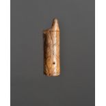 λAn Inuit needle case Old Bering Sea, circa 200 - 500 AD walrus ivory, cylindrical with incised