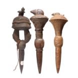 Three Baule prestige staffs Ivory Coast finely carved, two with Janus masks and surmounted with a