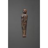 λA Thule standing figure Alaska, circa 1000 AD marine ivory, with carved defined features, 7.8cm