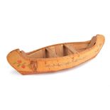 An Ojibwe model canoe Northeast America cedar, birchbark and quill, with a collection label R.