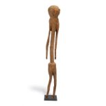 A Moba figure Togo standing with a gentle forward lean, 105.5cm high, on a stand. (2) Provenance