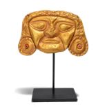 λA Lambayque gold mask Peru, possibly circa 900 - 1400 AD embossed, wearing a headband with a wavy