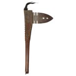 A Plains war club with a large steel pierced blade and a brass studded haft, with a leather