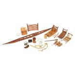 λThree Inuit model sleighs Greenland pine, cedar and bone, the wooden examples with bone runners,