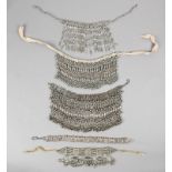 λFive Yemen necklaces silver coloured metal, one with coral beads, 28cm wide and one with