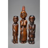 Three Zulu standing figures South Africa including a male with a head ring, bead eyes and