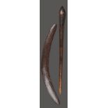 An Aboriginal club Australia with fine linear decoration and a pointed terminal, 67.5cm long, and an