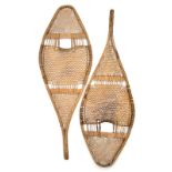 A pair of Alonquin snowshoes Subarctic wood with bound gut, late 19th / early 20th century, 114cm
