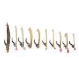 λA collection of ten Solomon Island fish hooks Melanesia shell, turtleshell, fibre, fishing wire and