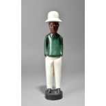 A Baule colon male figure Ivory Coast painted, 31.5cm high.