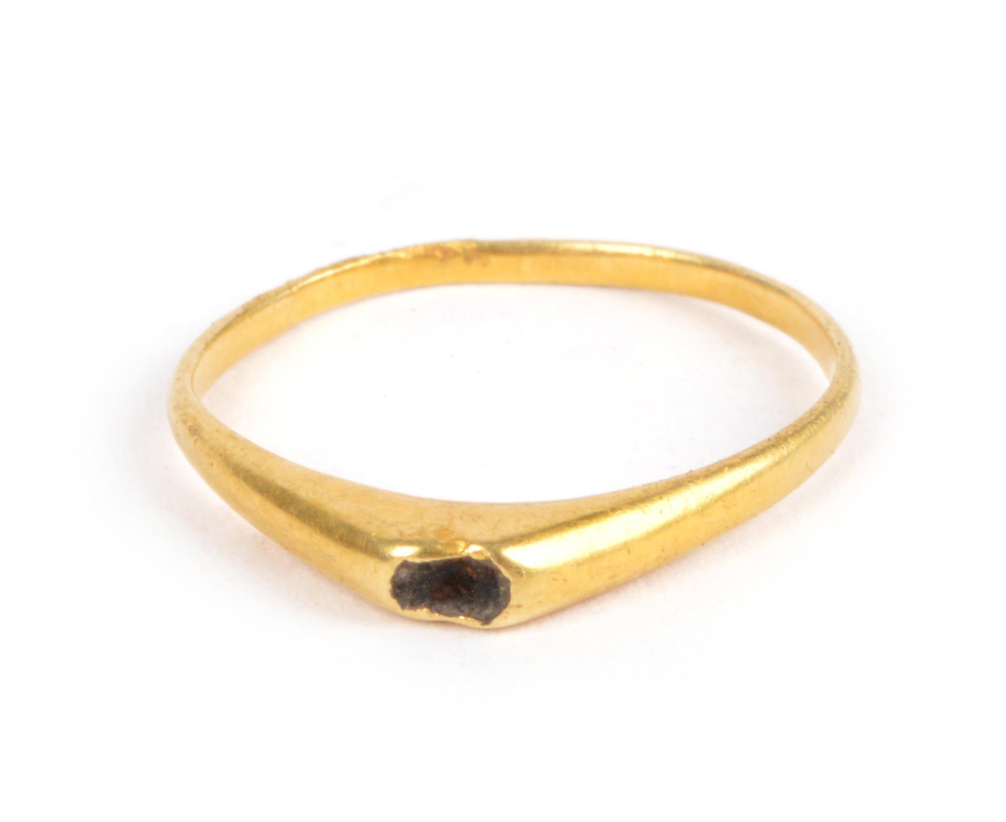 A Medieval gold stirrup Bishops ring circa 13th - 14 century AD stone missing, 2.2 grams. Provenance