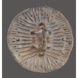 An Arussi shield Ethiopia hide with embossed lines and ovals with finely tooled decoration, with a