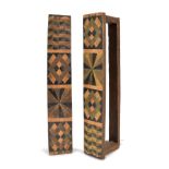 A pair of Zulu blanket racks South Africa with painted geometric designs, 41.5cm long. (2)