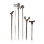 Six cloak pins tupu Central and South America silver coloured metal, copper and brass, including