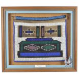 A Ndebele beaded apron pepetu South Africa cloth with coloured glass beads, worked geometric designs