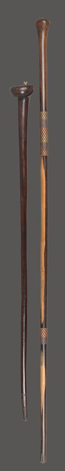 Two Zulu staffs South Africa one with copper, iron and brass wire mounts, 95.5cm long, and the other