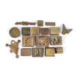 Seventeen Ashanti gold weights Ghana brass, mainly geometric, including a triple shell and a knot