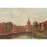 Hugo van Schaik (Dutch 1872-1946) View of a Dutch town on a river; Dutch river landscape near a