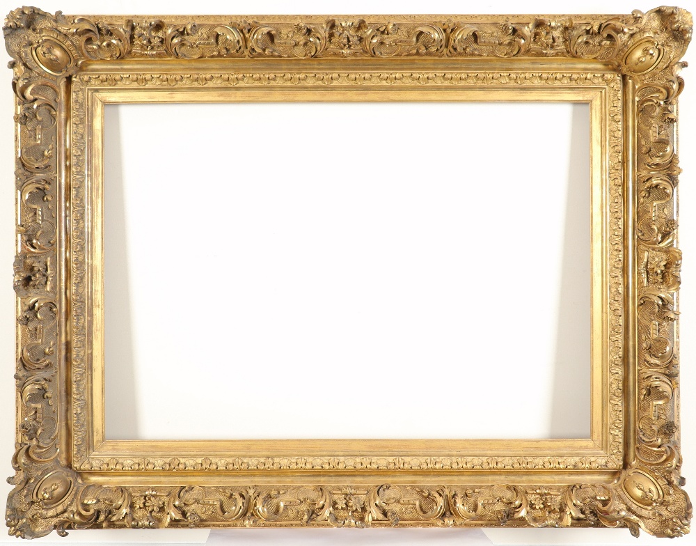 A 19th Century Continental giltwood and gesso frame With corner cartouches, scroll and acanthus leaf