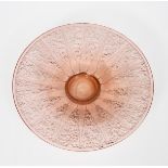 A large Daum Nancy acid-cut peach glass bowl, modelled in low relief with radiating panels, on