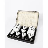 An unusual Shelley Eve shape coffee set for six in original case designed by Eric Slater, pattern