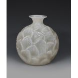 'Ormeaux' no.984 a Lalique cased glass vase designed by Rene Lalique, modelled in relief, white