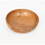 A Robert Mouseman Thompson oak bowl, adzed circular form with carved mouse signature to side,