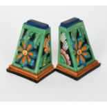 'Floreat' a pair of Clarice Cliff Fantasque Bizarre book ends, cast in relief and painted in colours
