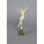 λ Ludwig Walter Exotic Dancer a carved ivory model of a bare breasted dancer, standing on one leg