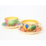 'Green Melon' a Clarice Cliff Fantasque Bizarre Globe tea cup and saucer, painted in colours, and