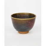 ‡ William Staite Murray (1881-1962) a stoneware tea bowl on narrow foot, covered with a running chun