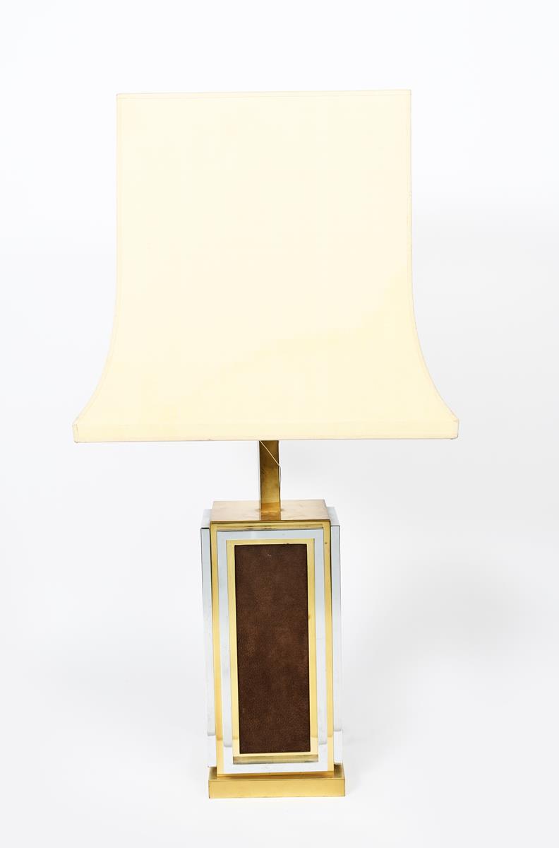 A Maison Janson table lamp, chrome and brass square section frame set with tan leather panels,