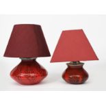 A WMF Ikora glass table lamp, red glass with black inclusions, cased in clear, compressed ovoid form