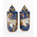 'Carp' a pair of Carlton Ware canister vases and covers, printed and painted in colours and gilt