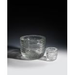 An Iittala clear glass Arkipelago vase designed by Timo Sarpaneva, thick clear cylindrical glass